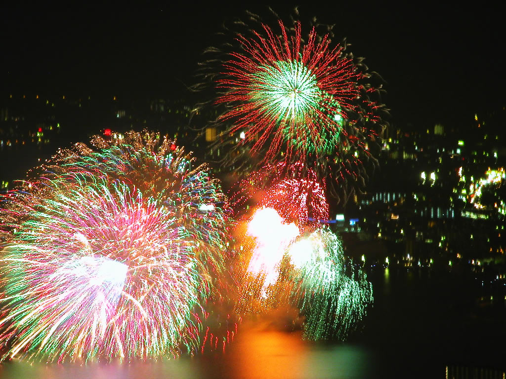 The surface of a lake in Lake Biwa which dyes by fireworks